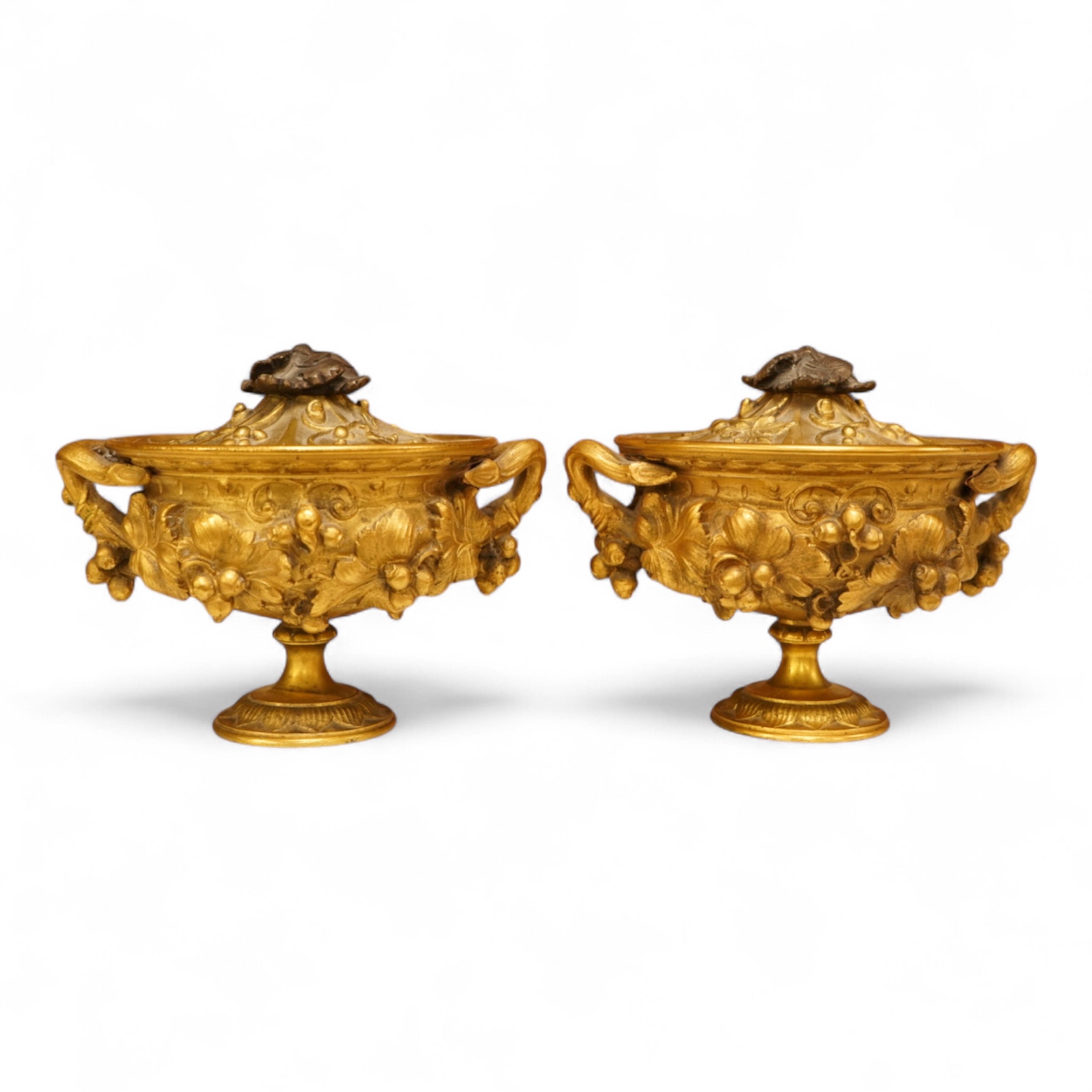 A pair of 19th century French ormolu lidded urns, 12cm